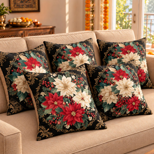 Royal Noir Blossom set of five black cushion covers with red and ivory flowers on a beige sofa in a festive home